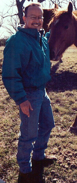 Erick in 1999 at Lucky Hit Ranch with his Thoroughbred filly, Ziba